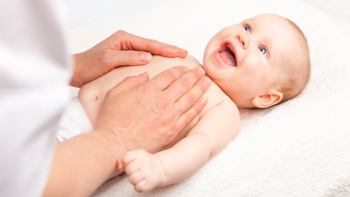 baby receiving massage therapy