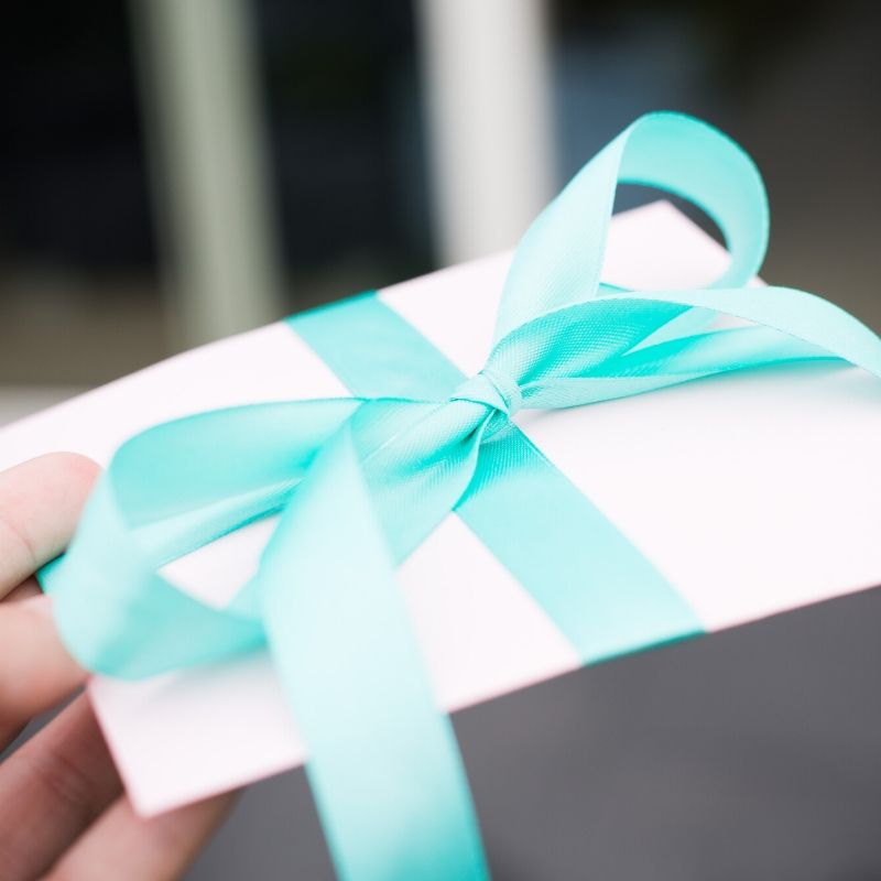 envelope tied with ribbon